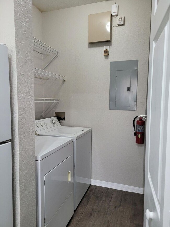 Building Photo - 828 Grand Regency Pointe #100 (1)