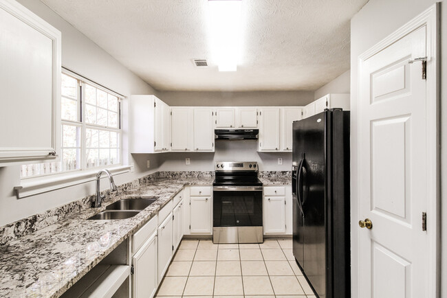 Building Photo - Home with Soaring Ceilings