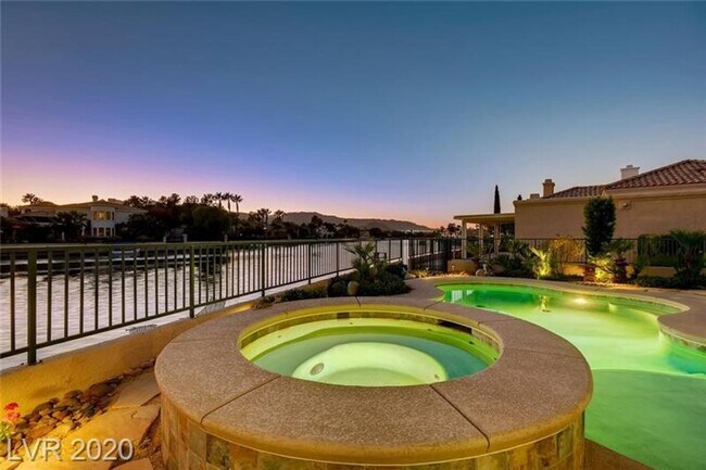 Building Photo - Vegas's Only Available Waterfront Rental ~ 4 Bedroom Desert Shores Lake Front Home