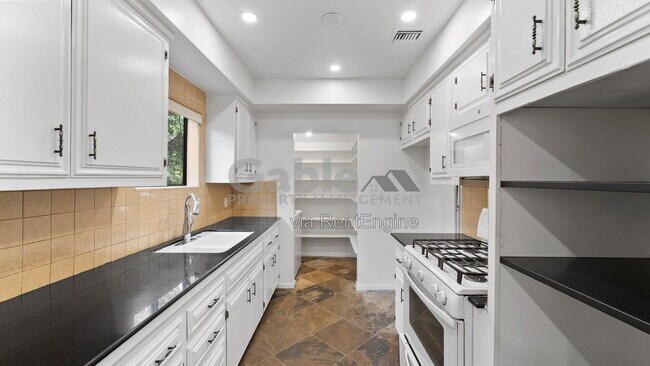 Building Photo - 6060 Colfax Ave