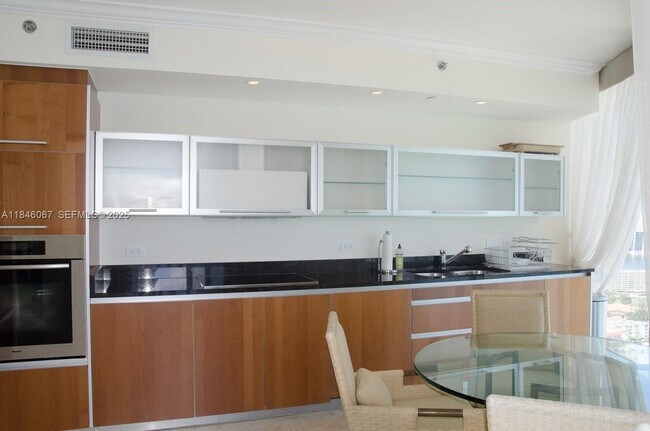 Building Photo - 17201 Collins Ave