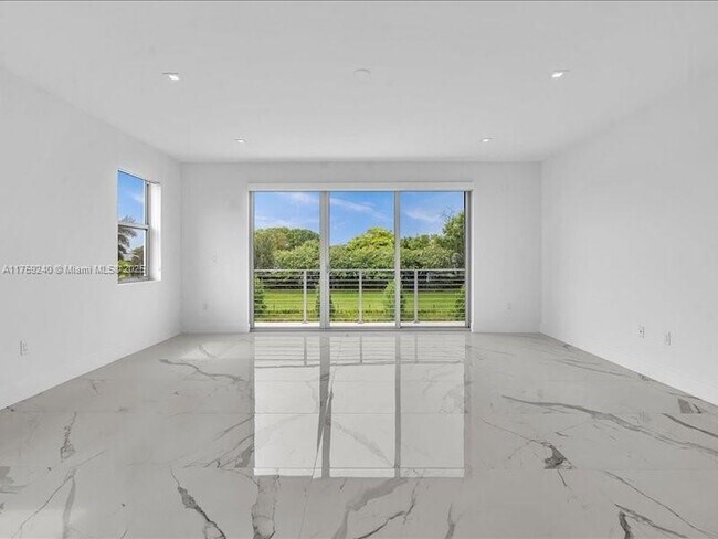 Building Photo - 16644 Botaniko Dr N