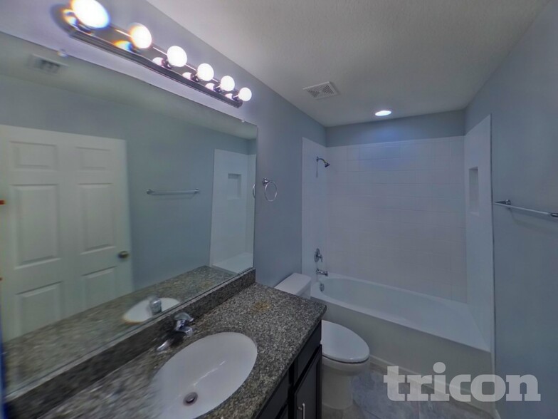 Building Photo - 7127 Summer Holly Pl