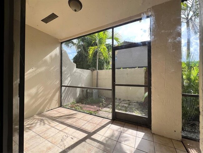 Building Photo - 10605 Royal Palm Blvd