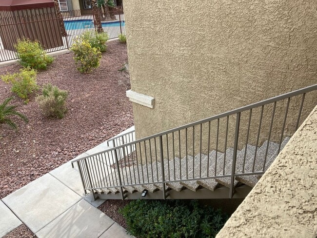 Building Photo - Gated community just minutes south of the strip, 2br/2bath, 2nd floor condo.
