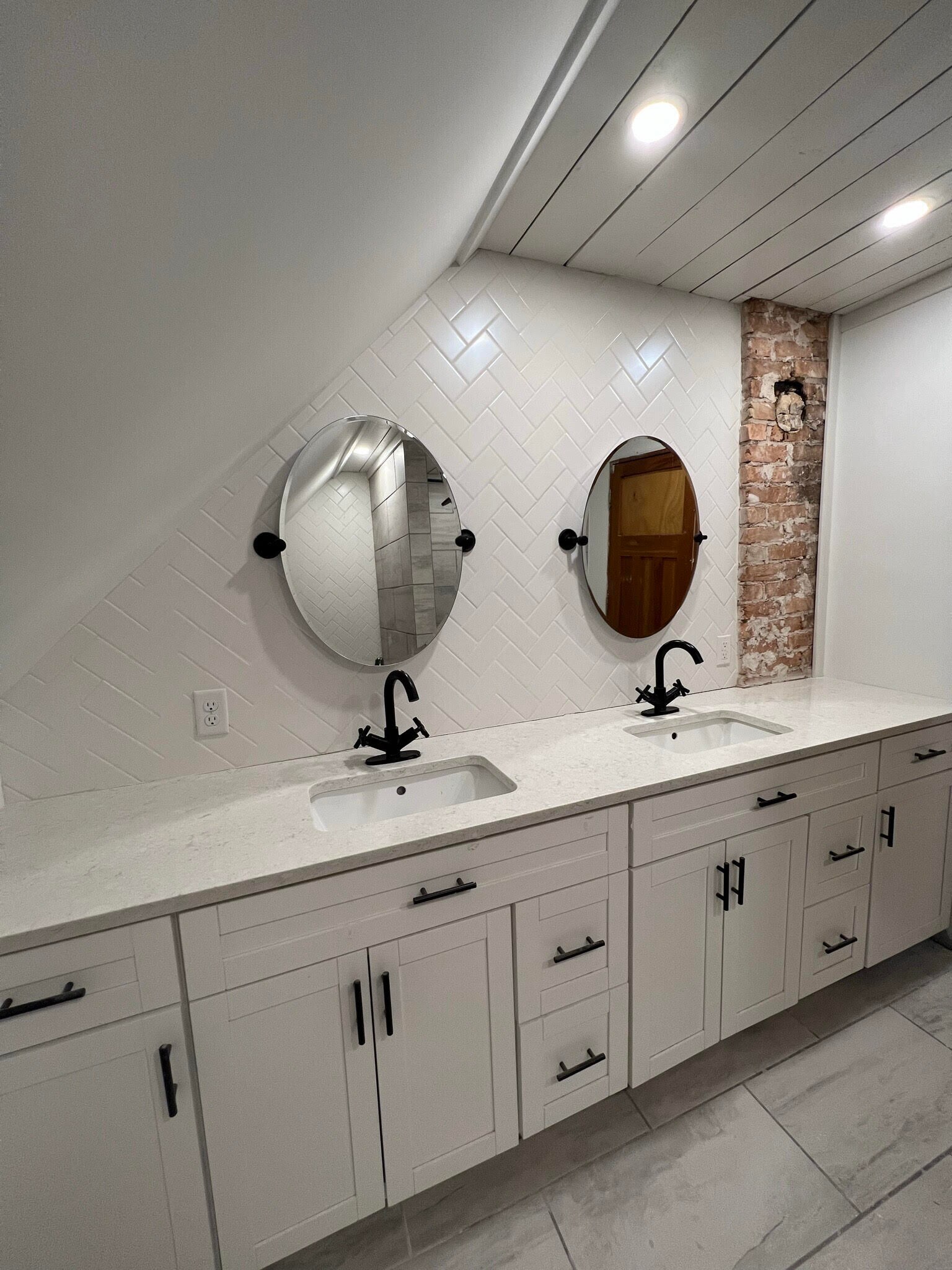 We have a double sink in the master bathroom with plenty of storage. - 624 Park St
