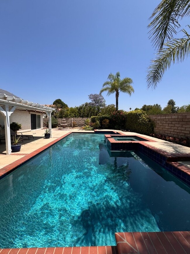 Building Photo - BEAUTIFULLY Updated Home with Pool+ Modern...