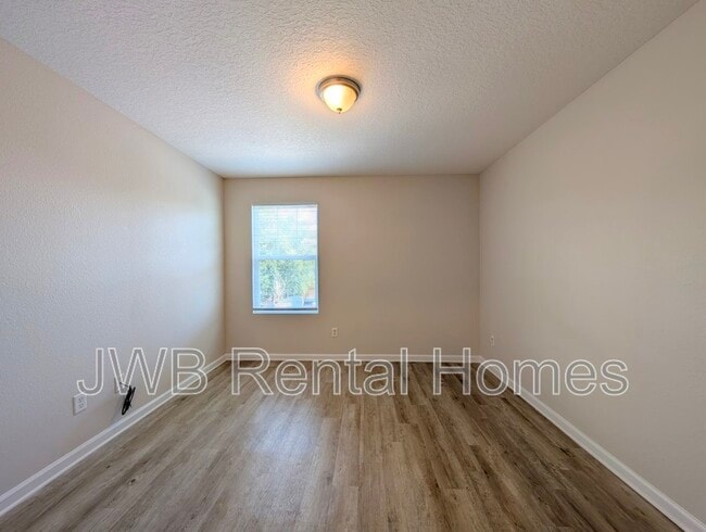 Building Photo - 7820 Playschool Ln