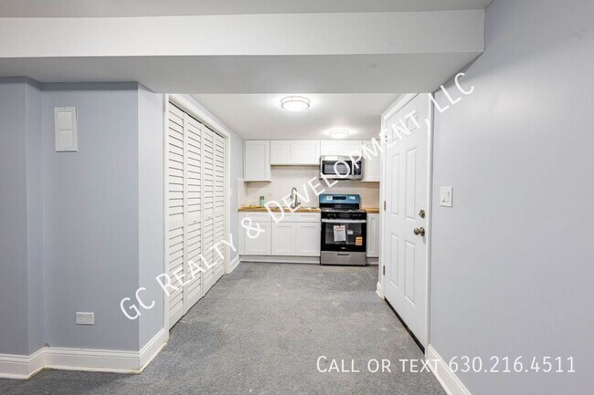 Building Photo - 6433 S Vernon Ave