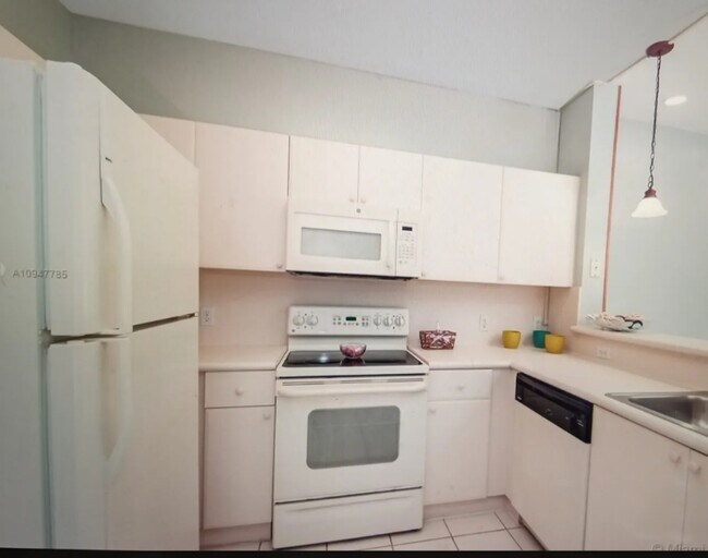 Building Photo - 18520 NW 67th Ave