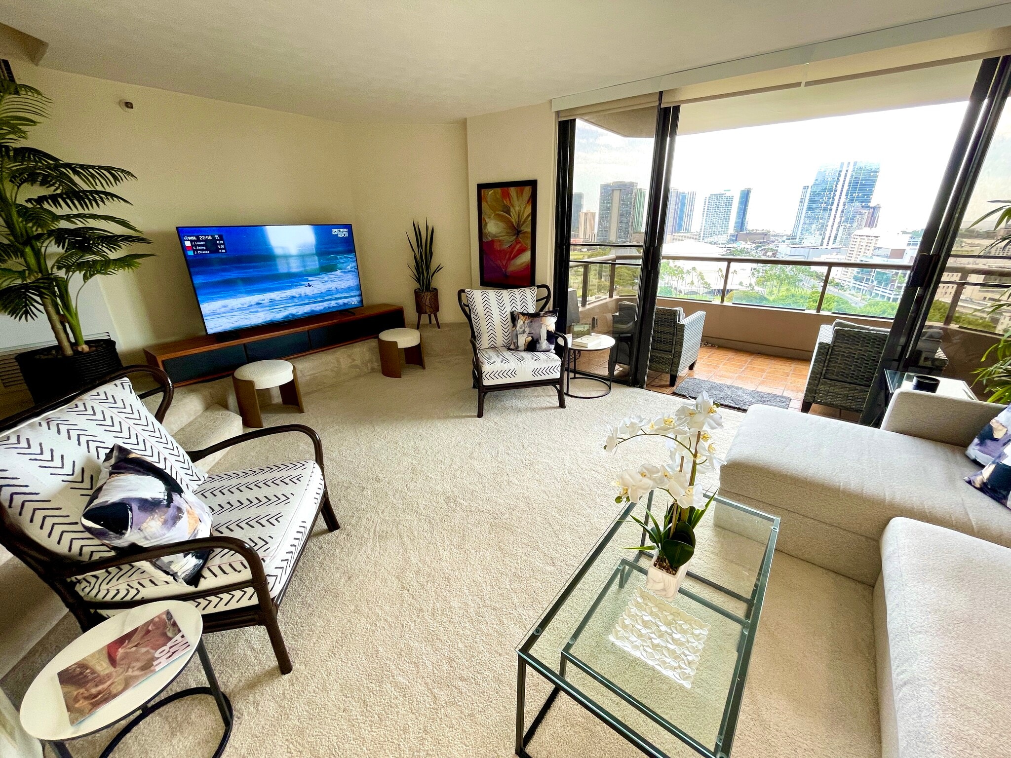A second view of entertainment area with 65" TV - 1221 Victoria St