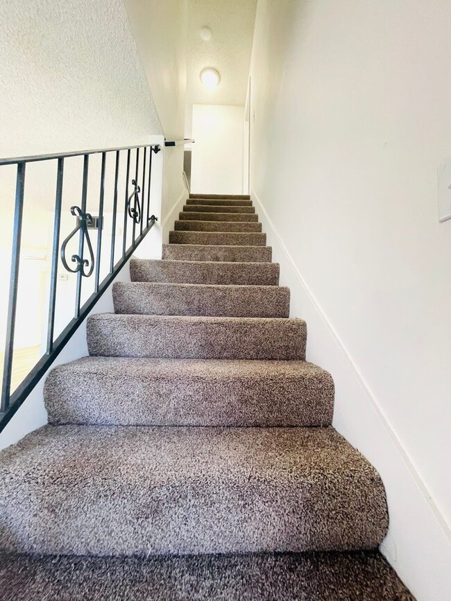 Building Photo - Todd Ranch Condo Welcome to the Todd Ranch Condo, 3-bedroom, 2-bathroom home located in the vibra...