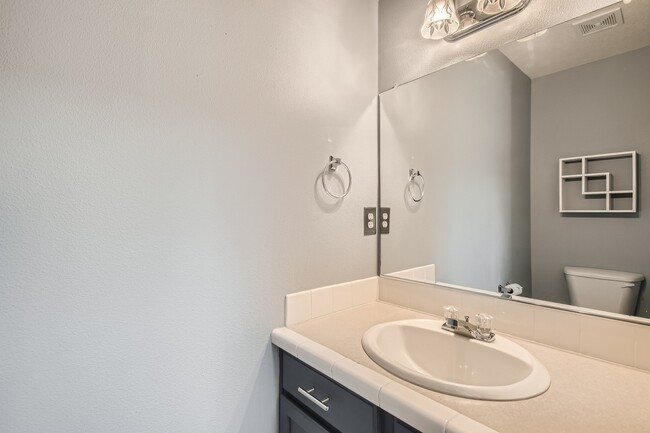 1/2 bath on main - 1437 NE Birkshire Ct