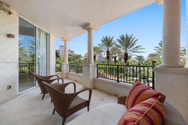 Building Photo - 7133 Fisher Island Dr