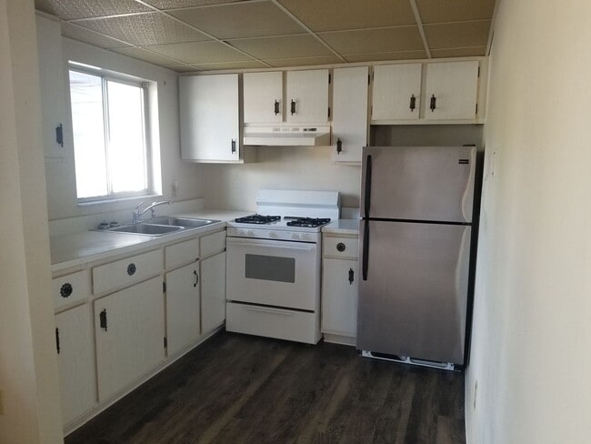 Building Photo - Charming, Affordable One-Bedroom Condo in 55+ Orchid Springs Community