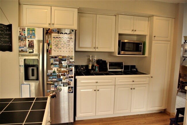 Building Photo - 6bed/4bath oversized 2 car garage fenced in back yard Cheyenne Mountain School District