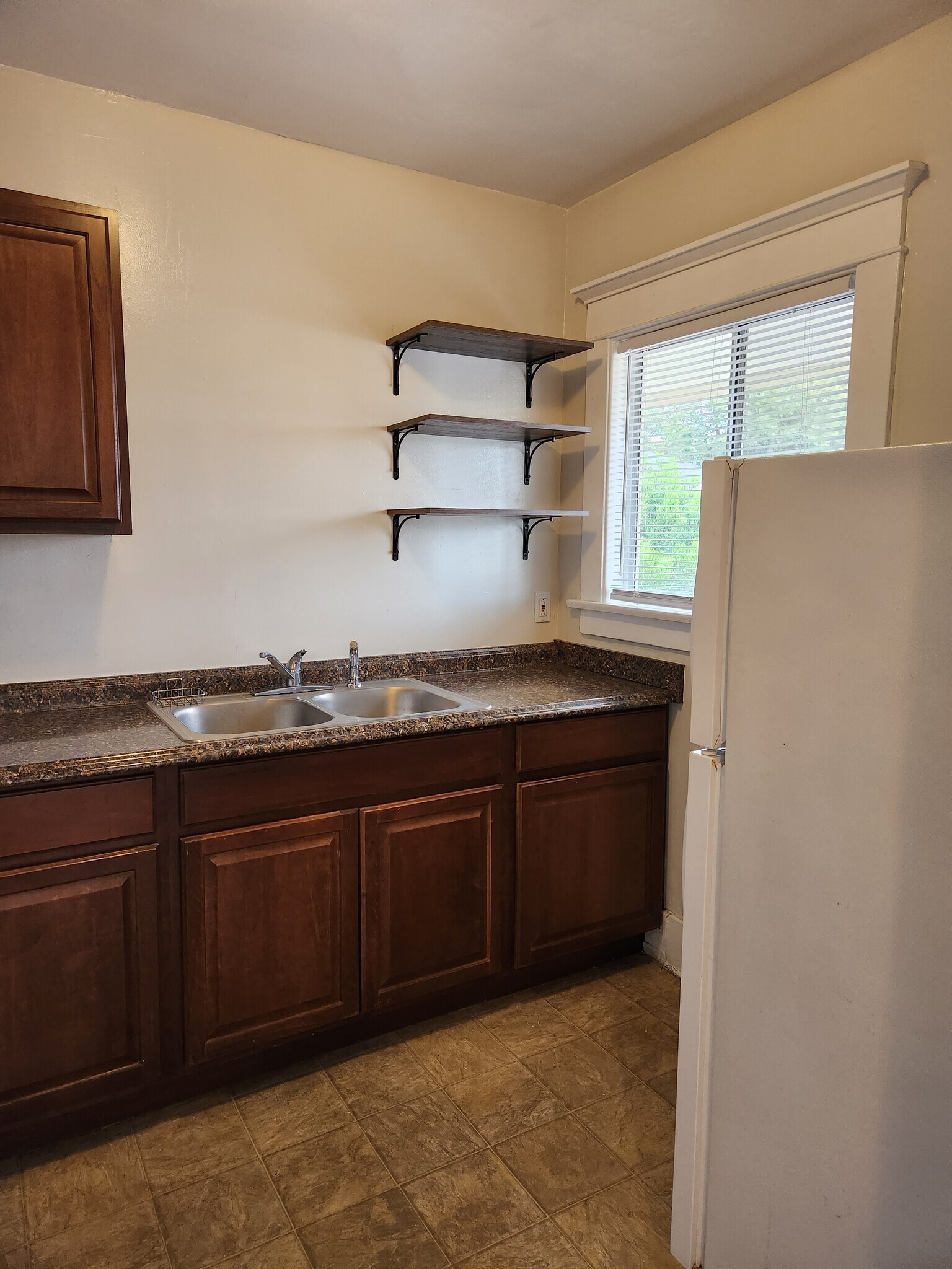 Newer kitchen with window - 3631 E 8th St