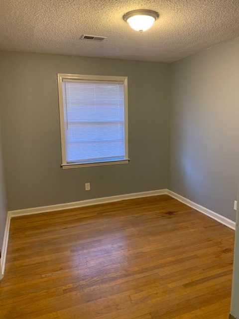 Building Photo - Beautiful freshly painted three bedroom home!