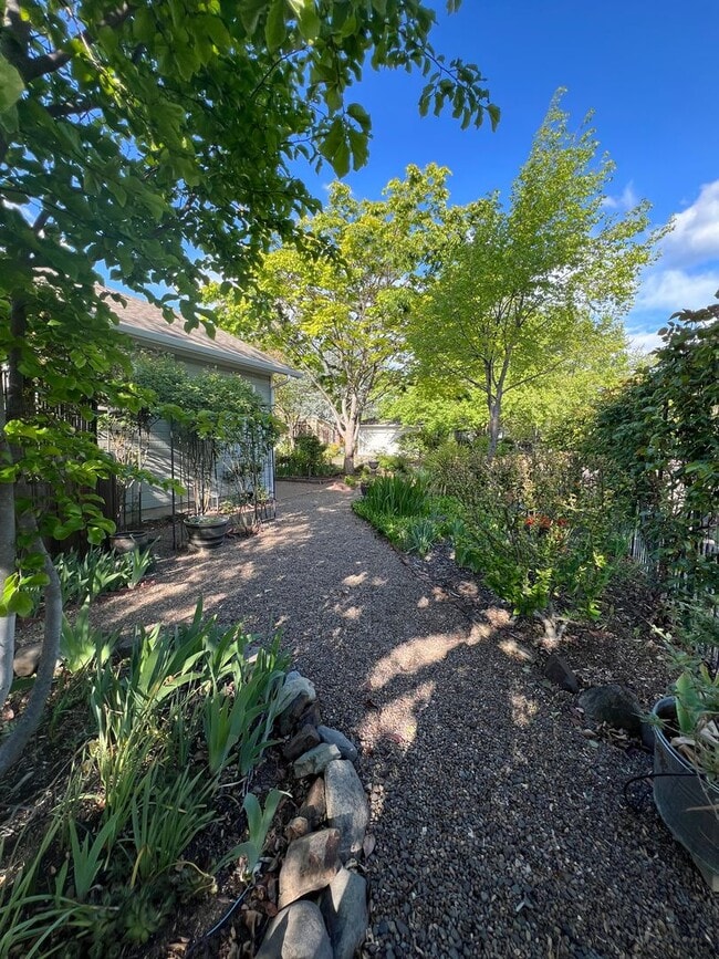 Building Photo - Gardener's Dream!  2 Bedroom house on quiet corner lot