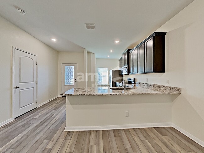Building Photo - 7942 Cactus Plum Drive