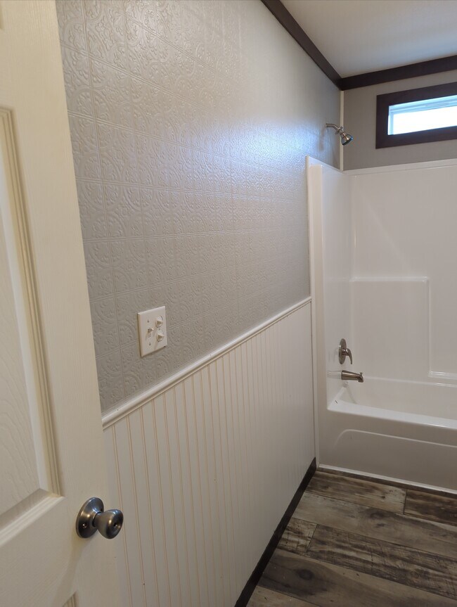 Guest Bathroom built in storage, shower/tub combo - 179 Davis Rd