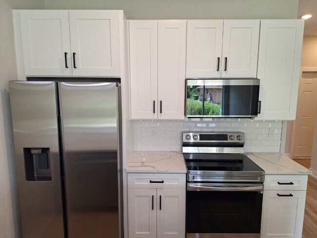 Building Photo - Available with ZERO DEPOSIT MOVE-IN!