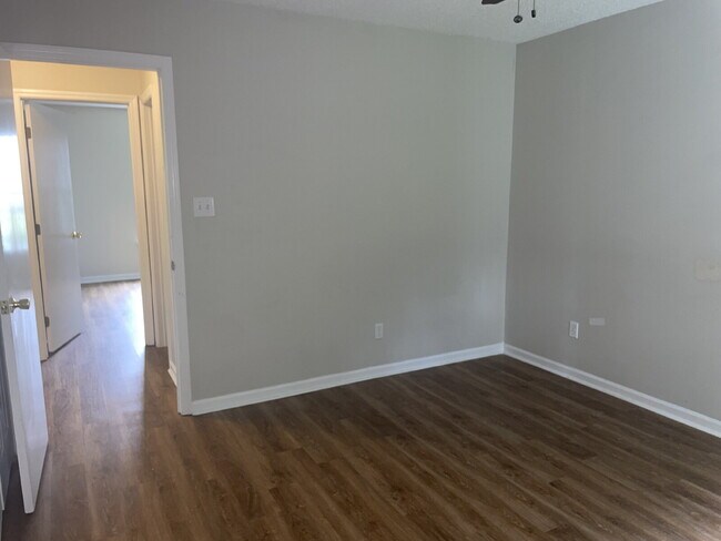 Building Photo - Two Bedroom Two Full Bathroom End Unit Tow...