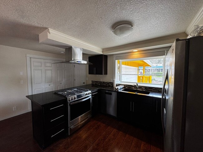 Building Photo - Charming 3 Bedroom Home with Beautiful Backyard & RV Parking