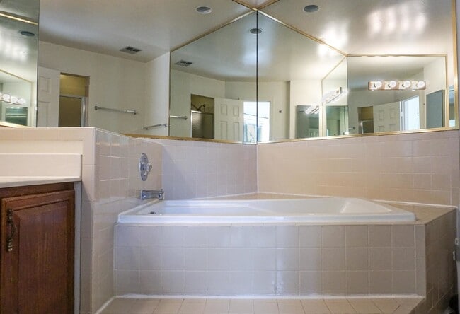 Building Photo - Beautiful brick townhome featuring three f...