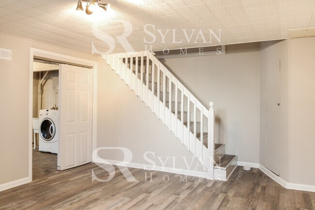 Building Photo - Turn the key. Enter. Smile. Repeat every day!