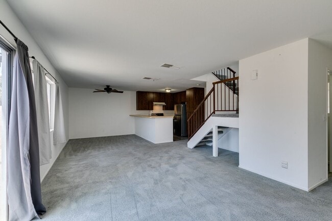 Building Photo - Double Primary Townhome with Spacious Backyard in 89115!