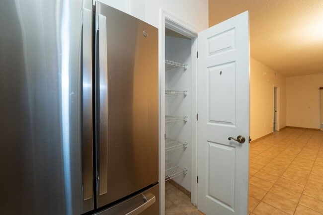 Building Photo - Belle Haven 2-Bedroom Condo with Pond View and Garage