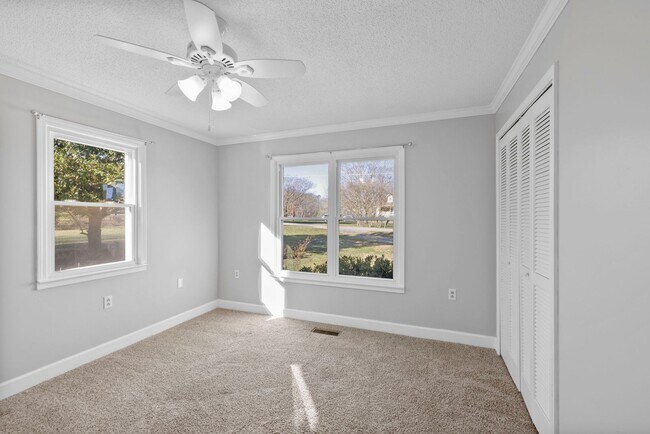 Building Photo - Welcome to this Comfortable, Charming & Outdoor Living, Single-Level Home