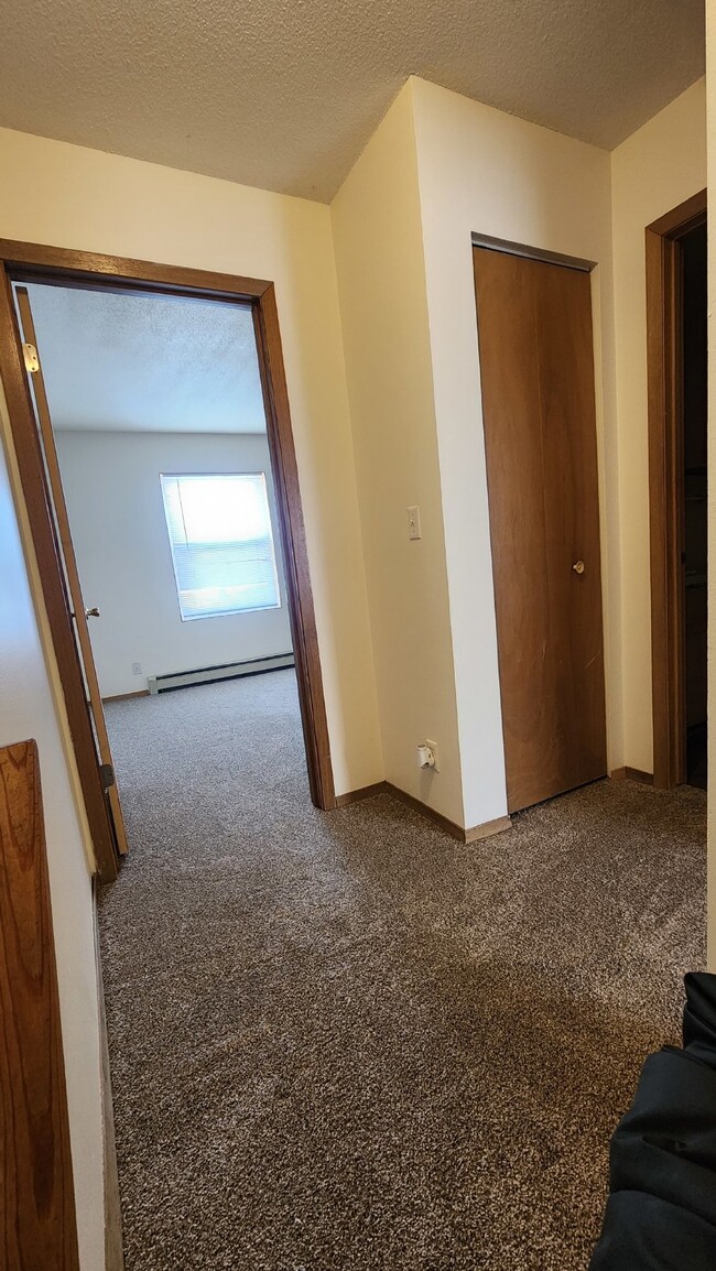 Building Photo - 2 Bedroom, 1.5 Bathroom Townhouse With Att...