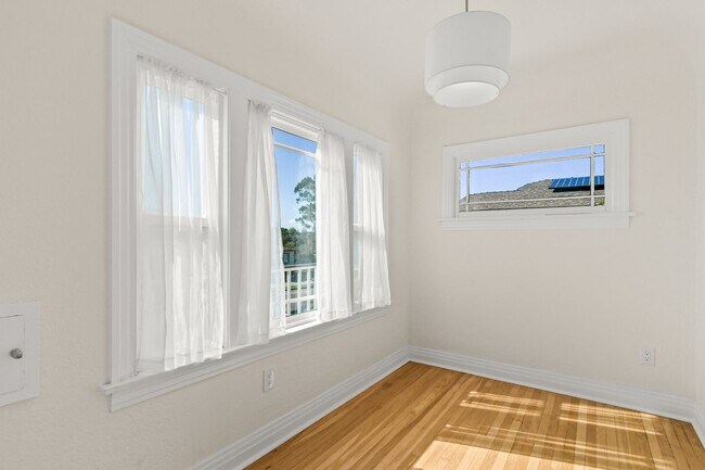 Building Photo - Move In Special!!  Elevated Golden Hill 2BR with Southwesterly Views with A/C & Detached Garage