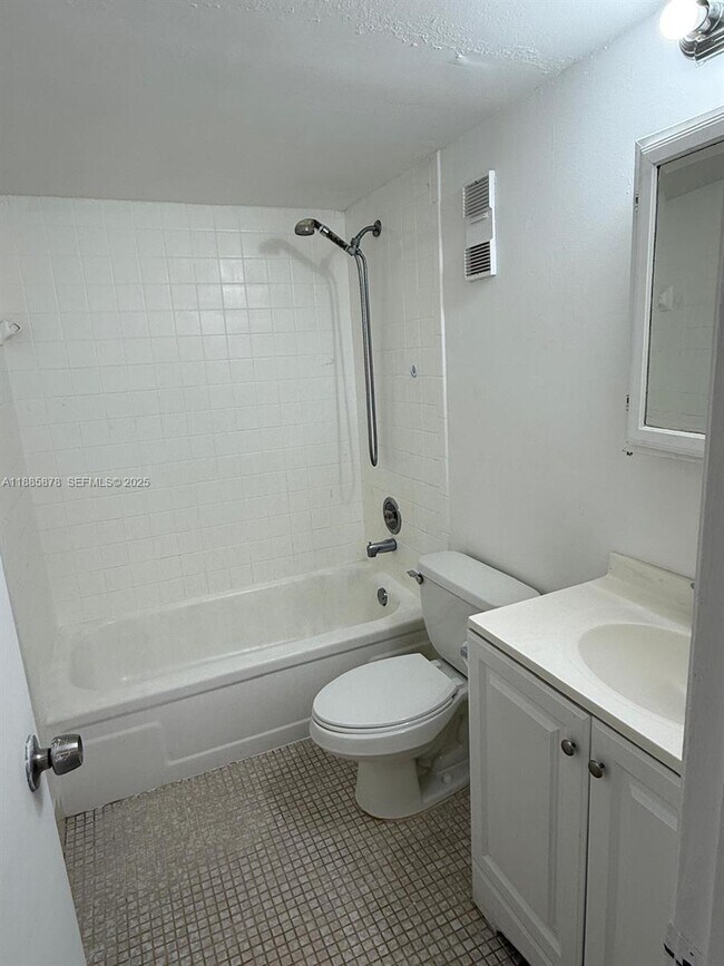 Building Photo - 8550 N Sherman Cir