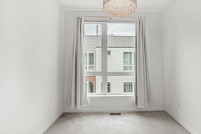 Building Photo - Modern 2BD, 3BA RiNo Townhome with Garage and Rooftop Deck