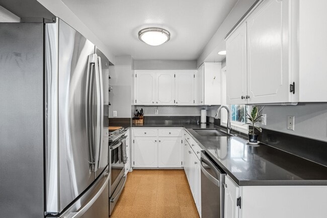 Building Photo - Charming SE Portland Bungalow with Dreamy Backyard Retreat & Stylish Updates