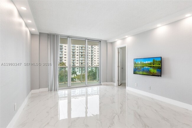 Building Photo - 19380 Collins Ave