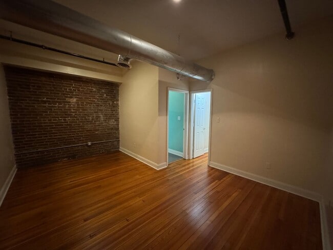 Building Photo - Penthouse above Benny's Pizza