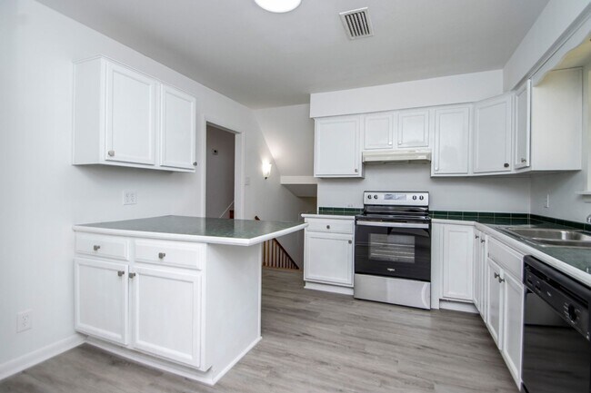 Building Photo - Welcome to a beautifully maintained 4-bedroom, 2-bathroom home located in the highly sought-after...