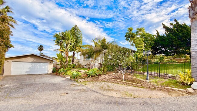 Building Photo - Beautiful Craftsman-style Home with fenced yard space, detached garage and additional parking in ...