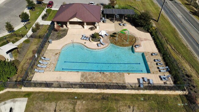 Building Photo - MOVE-IN READY | SOLAR PANELS | GREENBELT | COMMUNITY POOL & SPLASH PAD