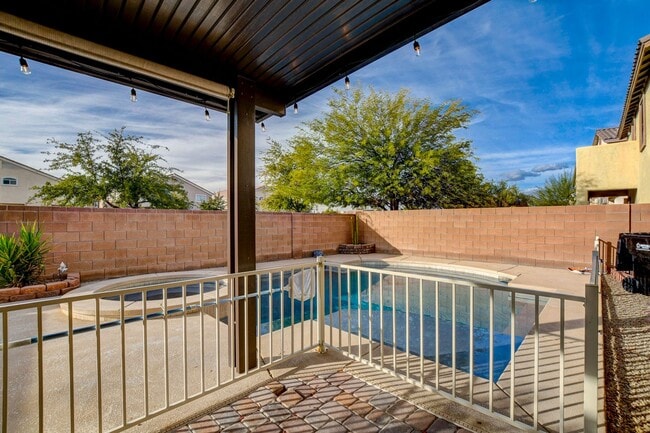Building Photo - Pool Home with Downstairs Primary Bedroom!