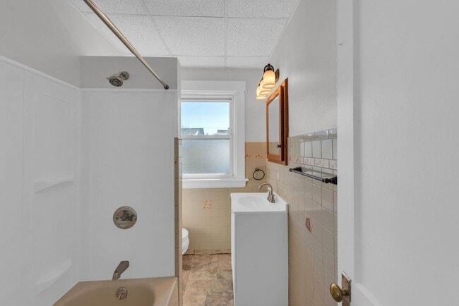 Building Photo - NORWOOD – Stunning Old-World Charm with Modern Comforts