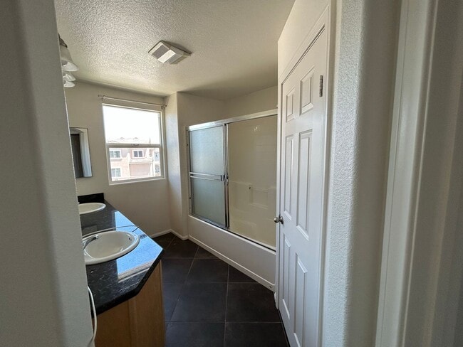 Building Photo - Spacious 3-Bedroom, 2.5-Bath Condo for Ren...