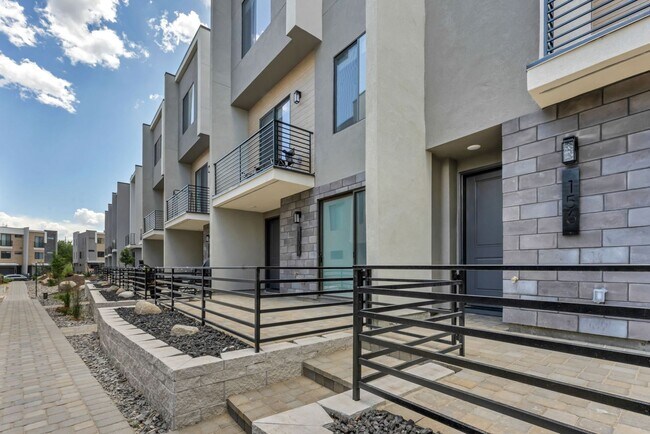 Building Photo - Fully Furnished Modern Townhome with utilities included and flexible lease options available