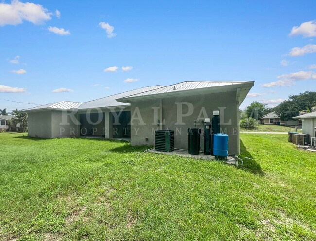 Building Photo - Spacious 3BR/2BA Duplex in Lehigh Acres & $500 Off Your First Month If You Apply by Aug 20th!