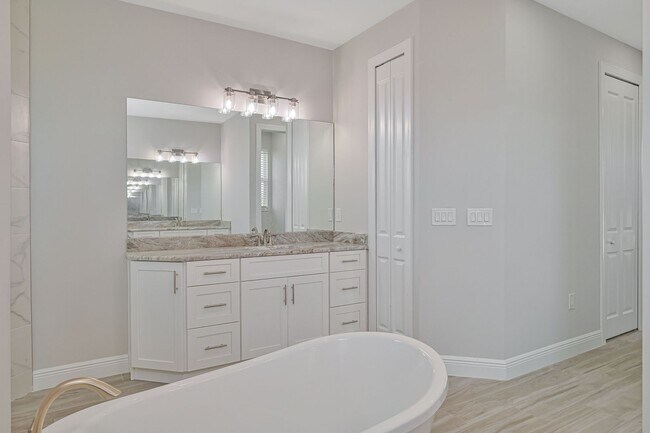 Building Photo - NOW AVAILABLE - Gorgeous Pool Home ~ NW Cape ~ 3 Car Garage ~ On Canal!
