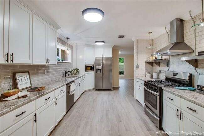 Building Photo - Remodeled home.....Country Feel but close ...